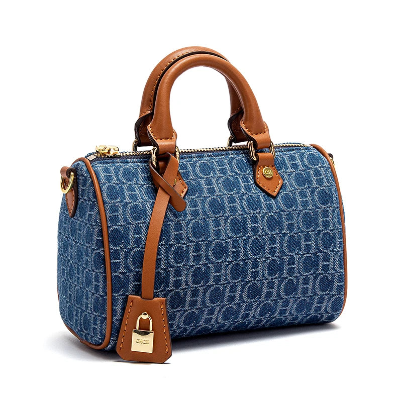 The Rivière — Denim-Spliced Saddle Pillow Bag