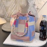 This multi-color knitted retro bucket handbag is simple and color-blocked, versatile and easy to carry with you