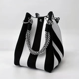 This multi-color knitted retro bucket handbag is simple and color-blocked, versatile and easy to carry with you