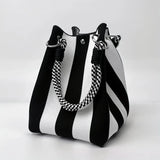 This multi-color knitted retro bucket handbag is simple and color-blocked, versatile and easy to carry with you