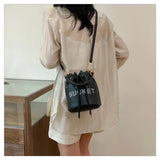 The Bucket Sling Bag