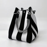 This multi-color knitted retro bucket handbag is simple and color-blocked, versatile and easy to carry with you