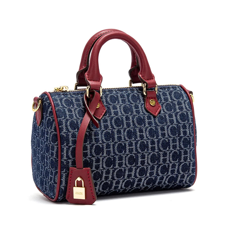 The Rivière — Denim-Spliced Saddle Pillow Bag