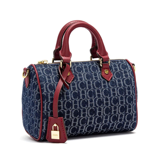 The Rivière — Denim-Spliced Saddle Pillow Bag